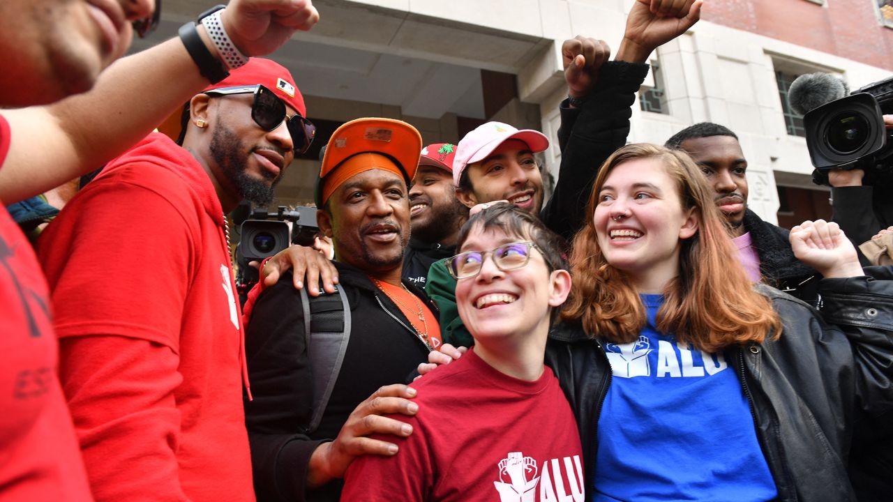 Union organizer Christian Smalls (left) celebrates after the vote for the unionization of the Amazon Staten Island warehouse in New York.