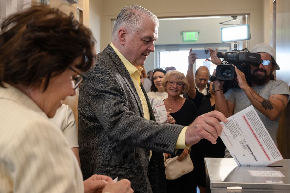 Democratic Gov. Steve Sisolak of Nevada drops his ballot at a polling location on June 1, 2022 in Las Vegas, Nevada.