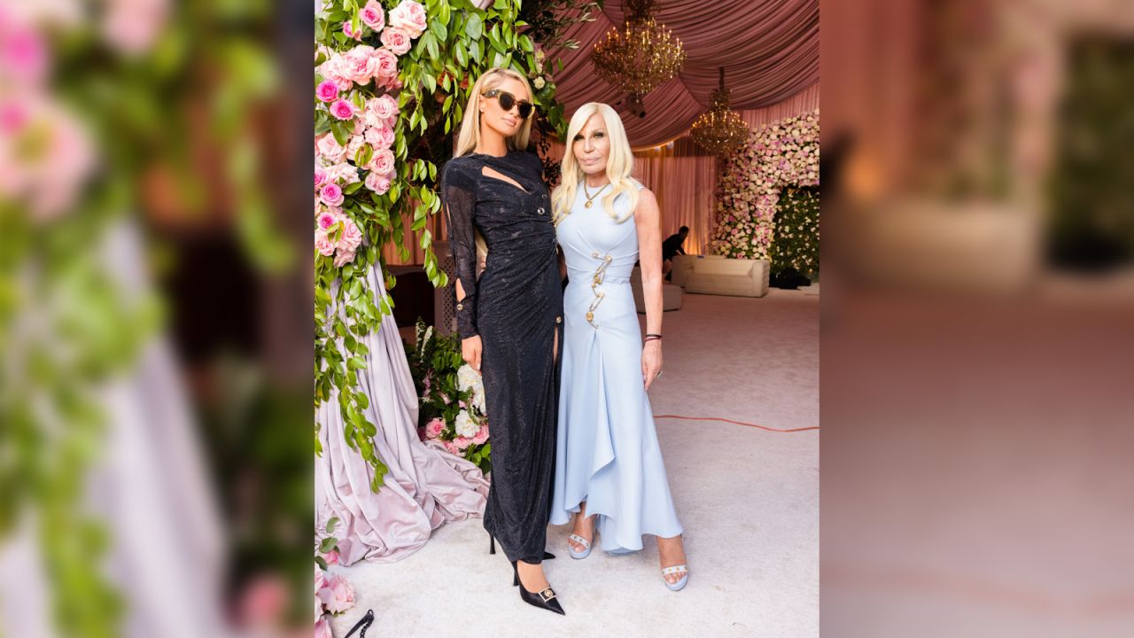 Paris Hilton and Donatella Versace pose for a photo at the wedding of Britney Spears. 