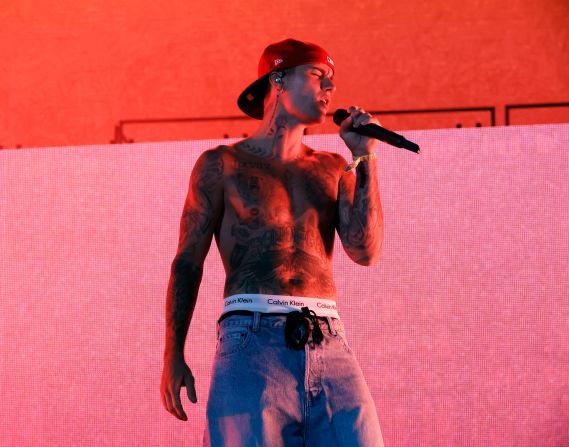 Bieber performs at the Coachella music festival in Indio, California, in April 2022. A couple of months later, he announced that he is taking a break from performing because <a href="index.php?page=&url=https%3A%2F%2Fwww.cnn.com%2F2022%2F06%2F10%2Fentertainment%2Fjustin-bieber-paralysis-ramsay-hunt%2Findex.html" target="_blank">he is suffering from paralysis on one side of his face.</a> He said it is related to his Ramsay Hunt syndrome and that he doesn't know how long it will take him to recover.