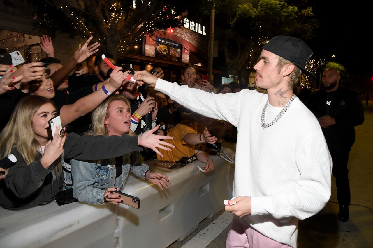 Bieber interacts with fans at the premiere of "Justin Bieber: Seasons," a 10-part YouTube docuseries that debuted in January 2020. Earlier that month, he revealed that he had been recently <a href="https://www.cnn.com/2020/01/08/entertainment/justin-bieber-lyme-disease-trnd/index.html" target="_blank">diagnosed with Lyme disease,</a> an infection caused by bacteria commonly carried by ticks.