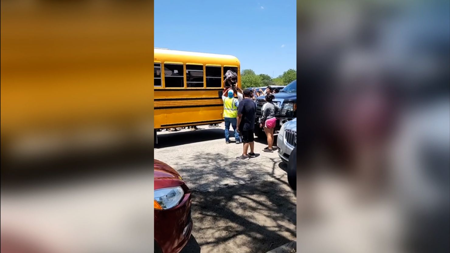 Gilbert Mata exits a school bus through a window shortly after a gunman killed 19 of his classmates and two teachers.