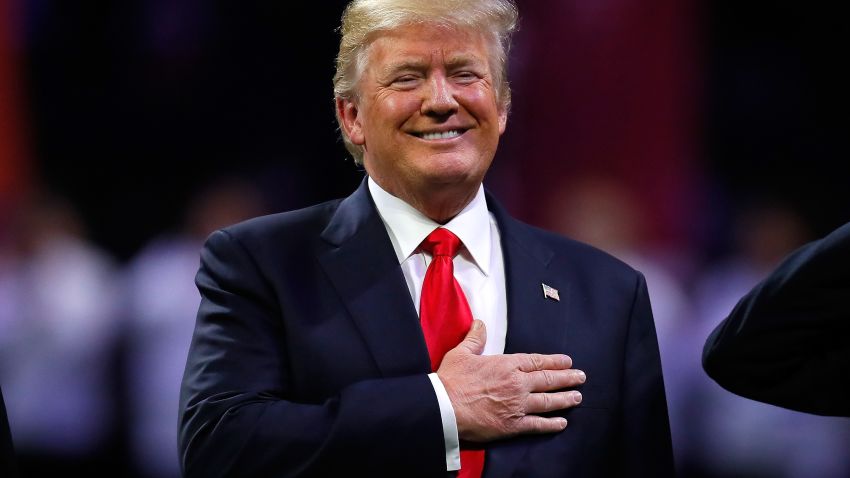 ATLANTA, GA - JANUARY 08:  U.S. President Donald Trump on field during the national anthem prior to the CFP National Championship presented by AT&T between the Georgia Bulldogs and the Alabama Crimson Tide at Mercedes-Benz Stadium on January 8, 2018 in Atlanta, Georgia.  (Photo by Kevin C. Cox/Getty Images)