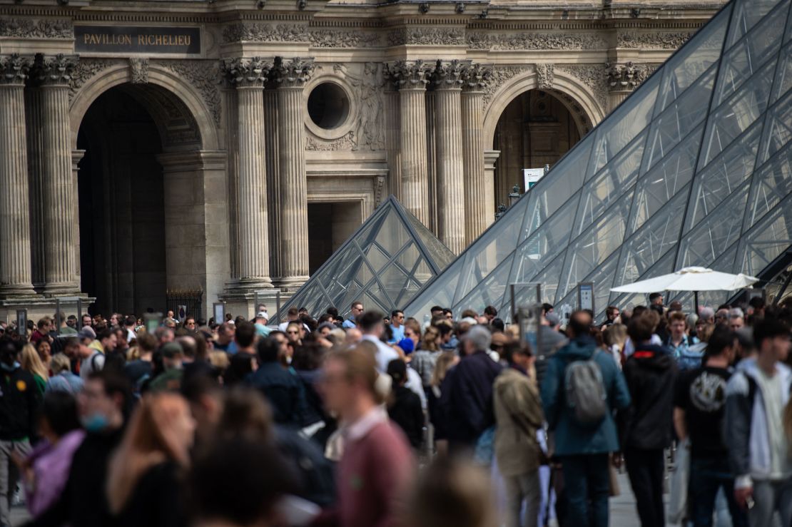 Visitors were already lined up to get into Paris' famed Louvre Museum on April 29. The summer travel season will be a very busy one in many parts of Europe. 