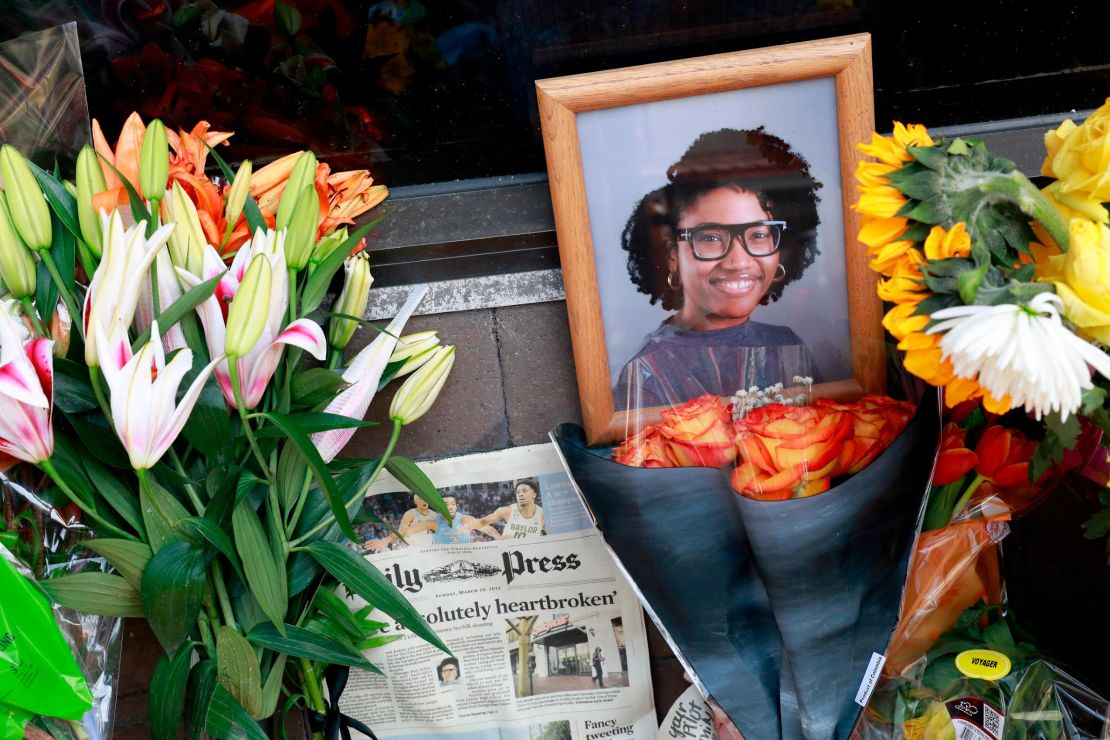 A memorial honors Sierra Jenkins and others shot outside a pizza restaurant in Norfolk, Virginia, in March.