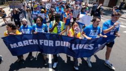 Demonstrators join the "March for Our Lives" rally in Los Angeles, California, on June 11, 2022. Protesters are demonstrating across the US for tighter firearms laws to curb devastating gun violence plaguing the country.