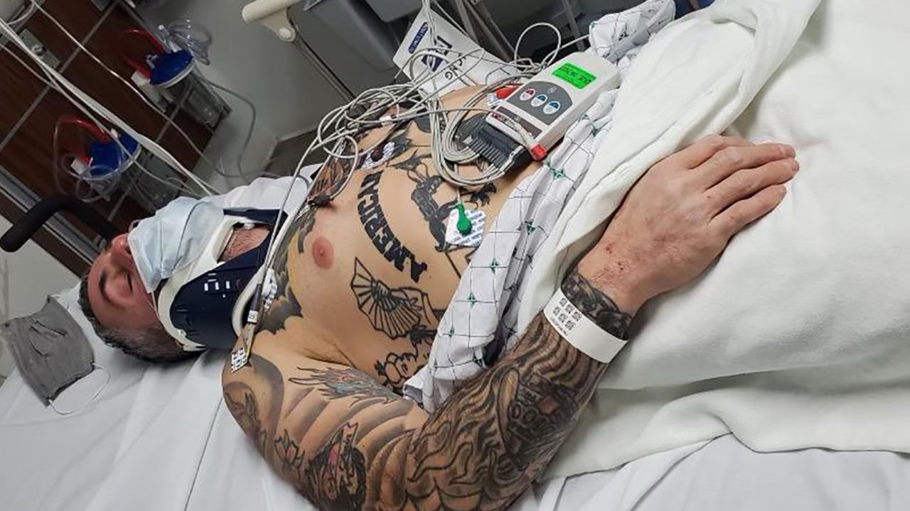 Michael Fanone, in a photo taken by his police partner, James Albright, in a hospital emergency room after protesters beat him on January 6, 2021.