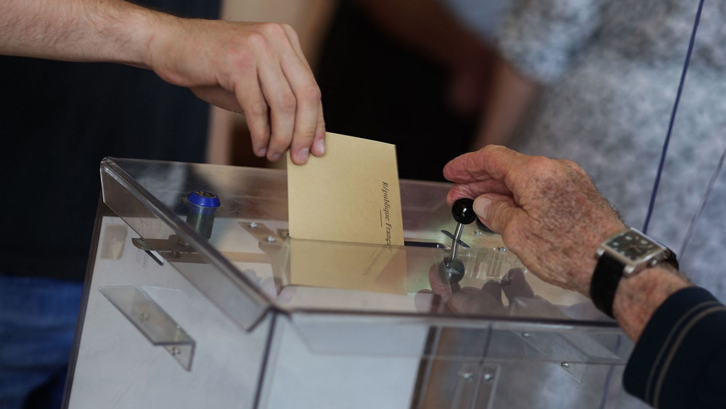 A voter casts his vote at a polling station during the French parliamentary elections in Saint-Savin, south-western France, on June 12, 2022. (Photo by Thibaud MORITZ / AFP) (Photo by THIBAUD MORITZ/AFP via Getty Images)