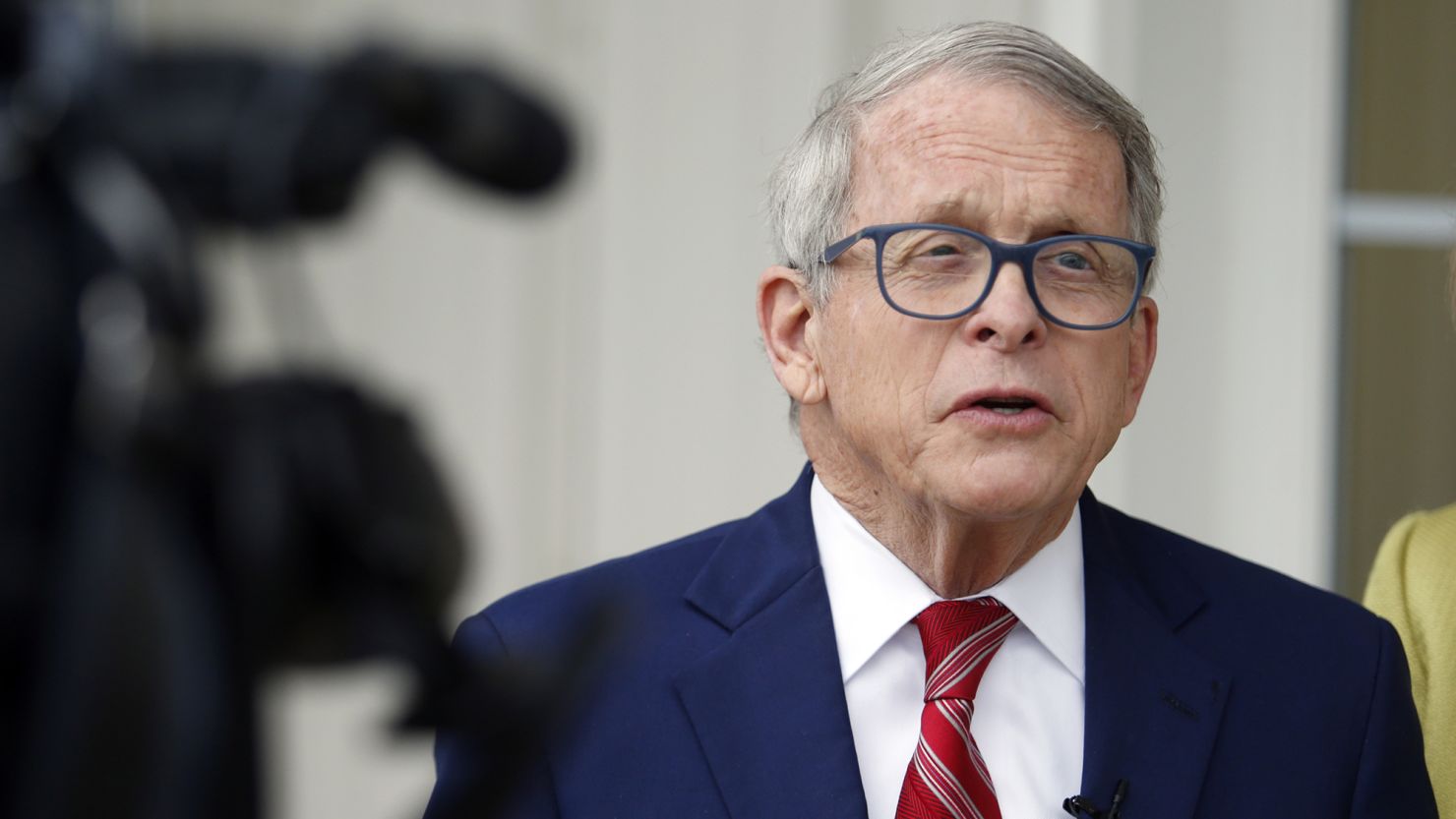 Ohio Gov. Mike DeWine talks with reporters in Cedarville, Ohio, on May 3, 2022.