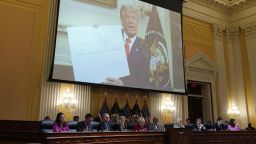 Former US President Donald Trump displayed on a screen during a hearing of the Select Committee to Investigate the January 6th Attack on the US Capitol in Washington, D.C., US, on Monday, June 13, 2022. The committee today sets out to prove Trump was directly and even legally culpable in the storming of the US Capitol on Jan. 6, 2021, making the case he kept pushing his stolen-election claim knowing it wasn't true. Photographer: Al Drago/Bloomberg via Getty Images