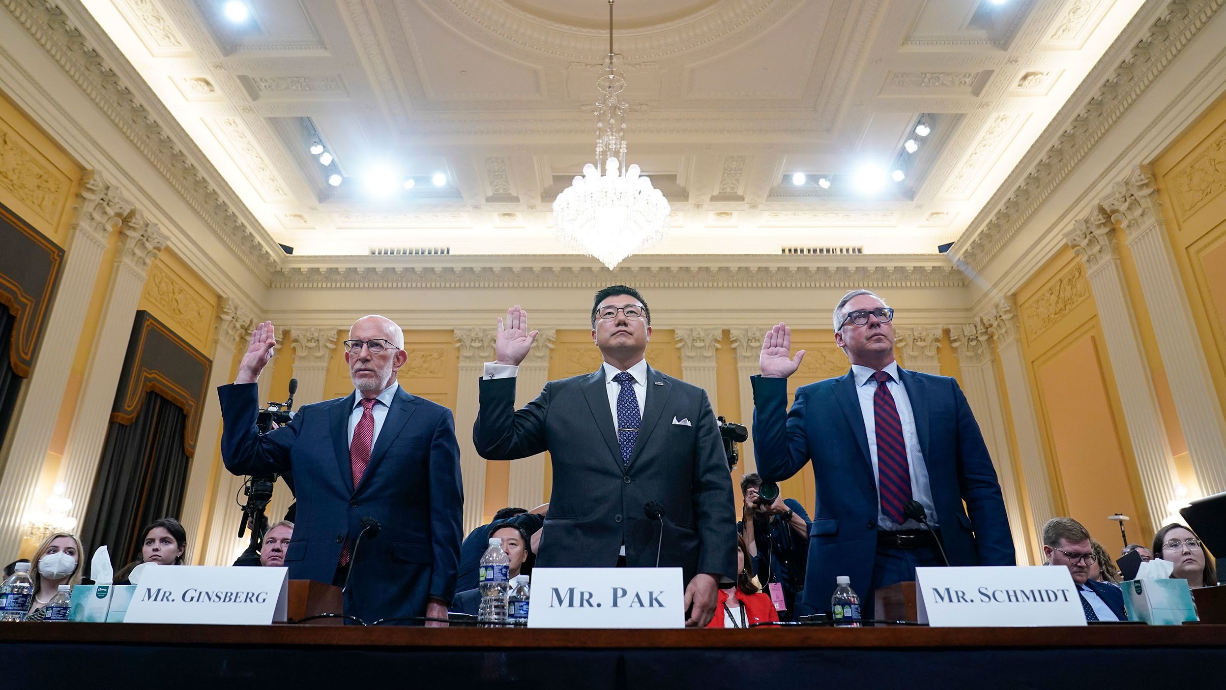 From left, conservative election attorney Benjamin Ginsberg, former US attorney BJay Pak and former Philadelphia city commissioner Al Schmidt are sworn in to testify on June 13. They all said it was clear Biden won the 2020 election and that Trump's claims of fraud were not factual.