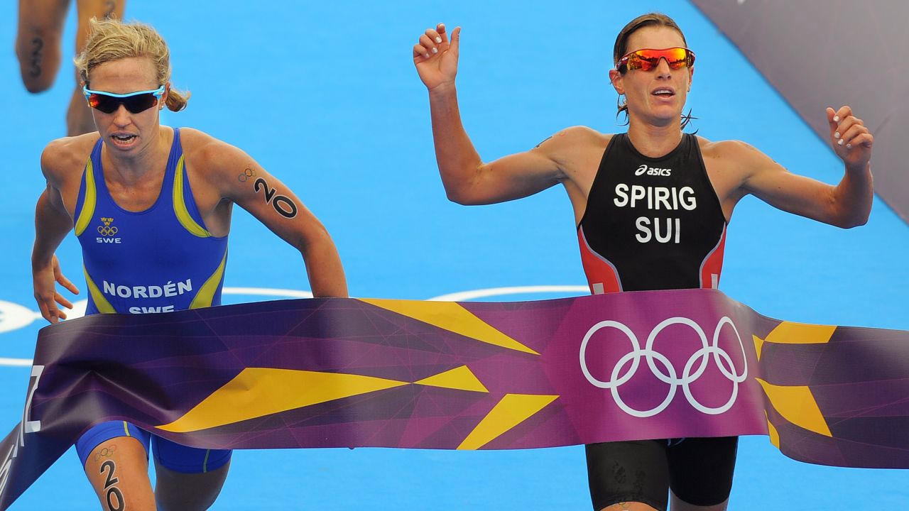 In perhaps the most dramatic finish triathlon has seen, Spirig crosses the line marginally ahead of Lisa Norden in London.