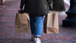 Shoppers walk in Georgetown, in Washington, DC, USA, 12 January 2022. 