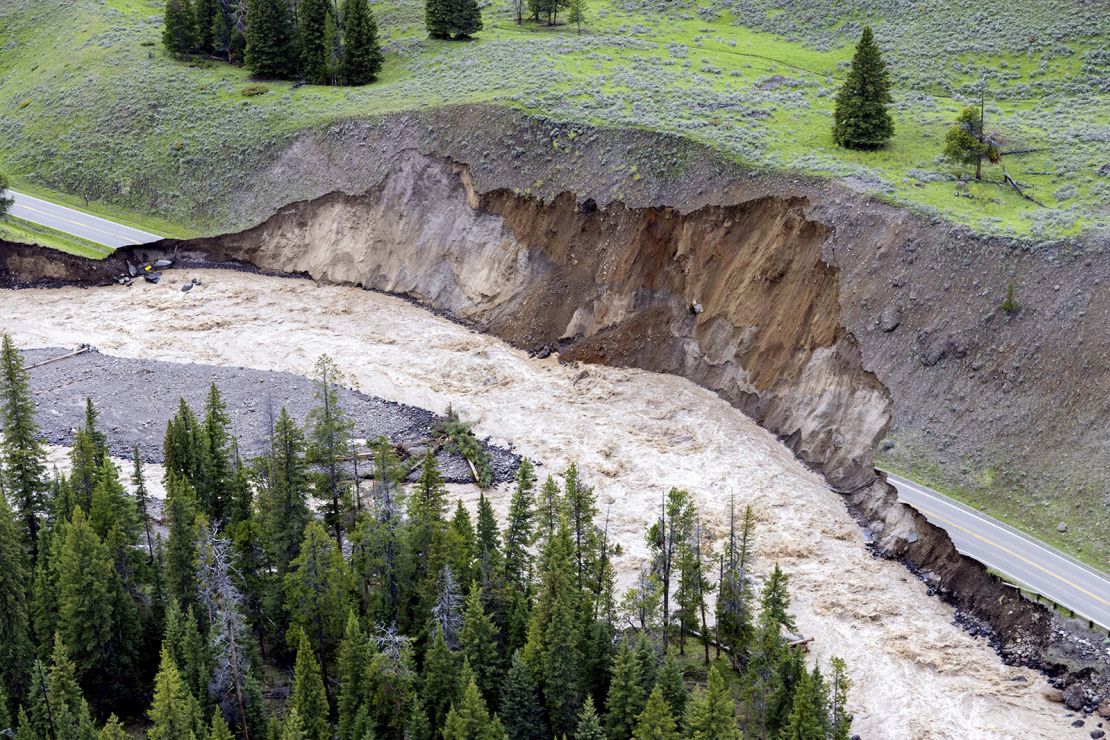 A road near Yellowstone National Park's northern entrance was significantly damaged by flooding.