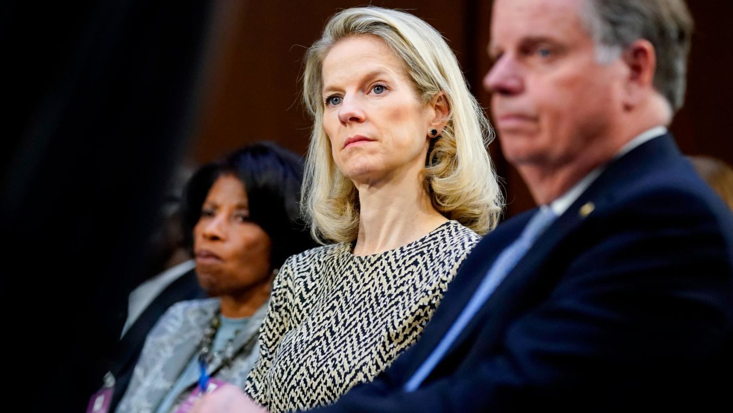 White House Counsel Dana Remus, center, listens during a confirmation hearing for Supreme Court nominee Ketanji Brown Jackson before the Senate Judiciary Committee on Capitol Hill in Washington, March 22, 2022.