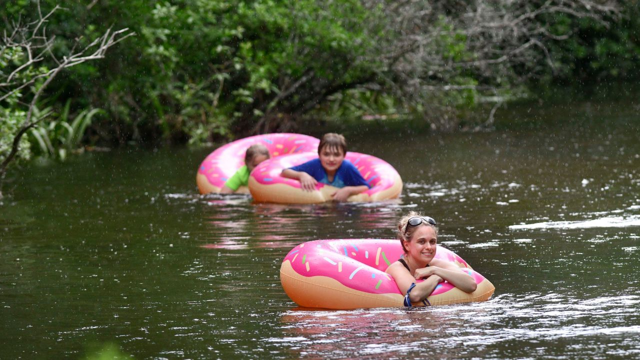 Liz Havard, Philip Smith and Miles Havard cool off Monday as they float down Turkey Creek in Niceville, Florida. The National Weather Service in Mobile issued a heat advisory for Monday and Tuesday, with heat index temperatures topping 100 degrees along the Florida panhandle.