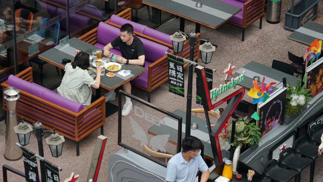 Customers at a restaurant in Huaxi Live shopping plaza in the Haidian district of Beijing, June 6, 2022.