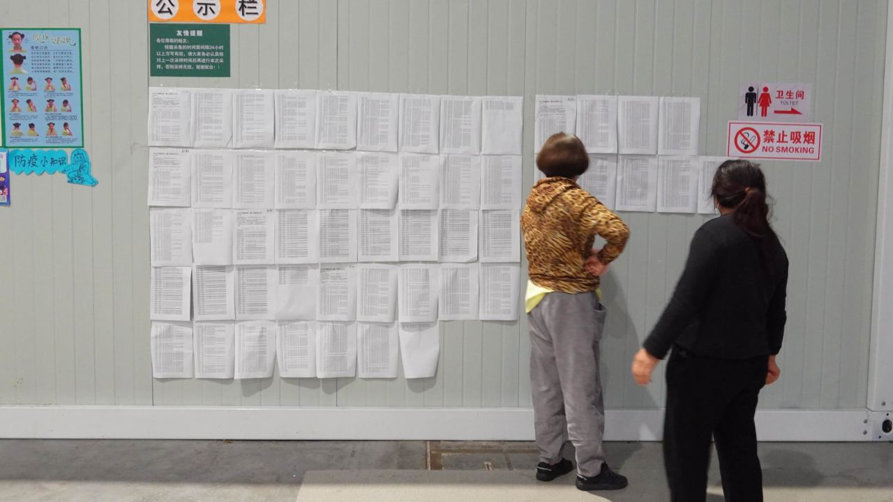 Covid test results are posted on the wall in the "lucky clover" quarantine site.