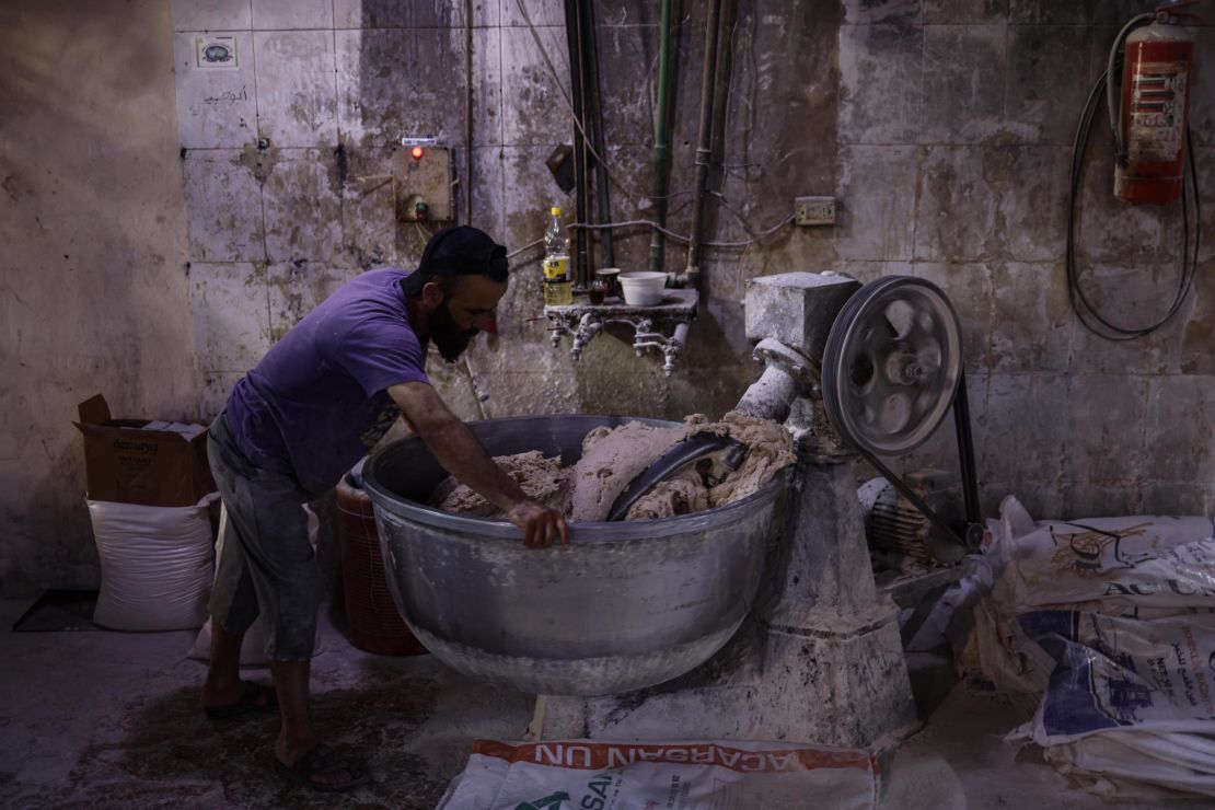 A Syrian worker operates a kneading machine at a bakery in Idlib City on June 12. Watchdogs have warned of potentially disastrous consequences if Syria's wheat supplies are disrupted. The war-torn country is heavily dependent on Russia for much of its supplies.