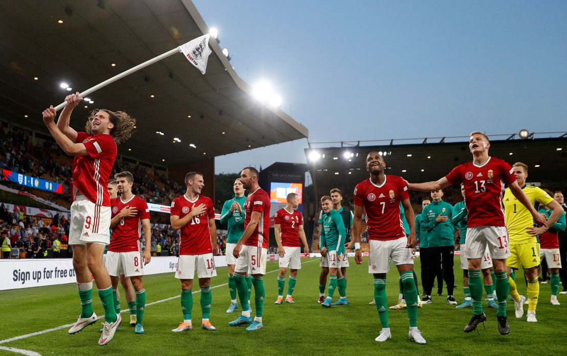 Hungary's players celebrate a famous win against England. 