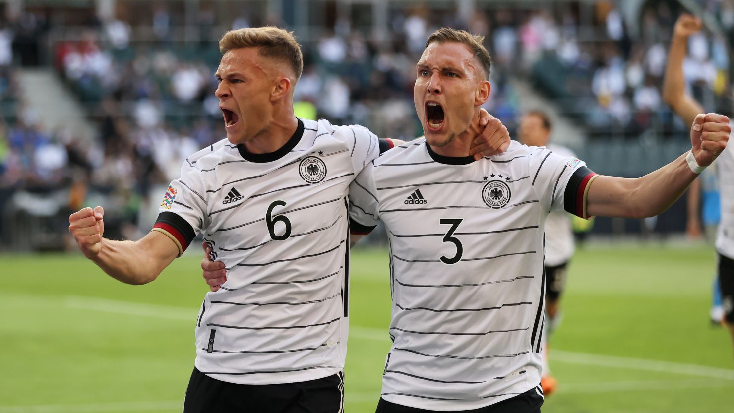 Joshua Kimmich (left) scored Germany's first goal against Italy. 