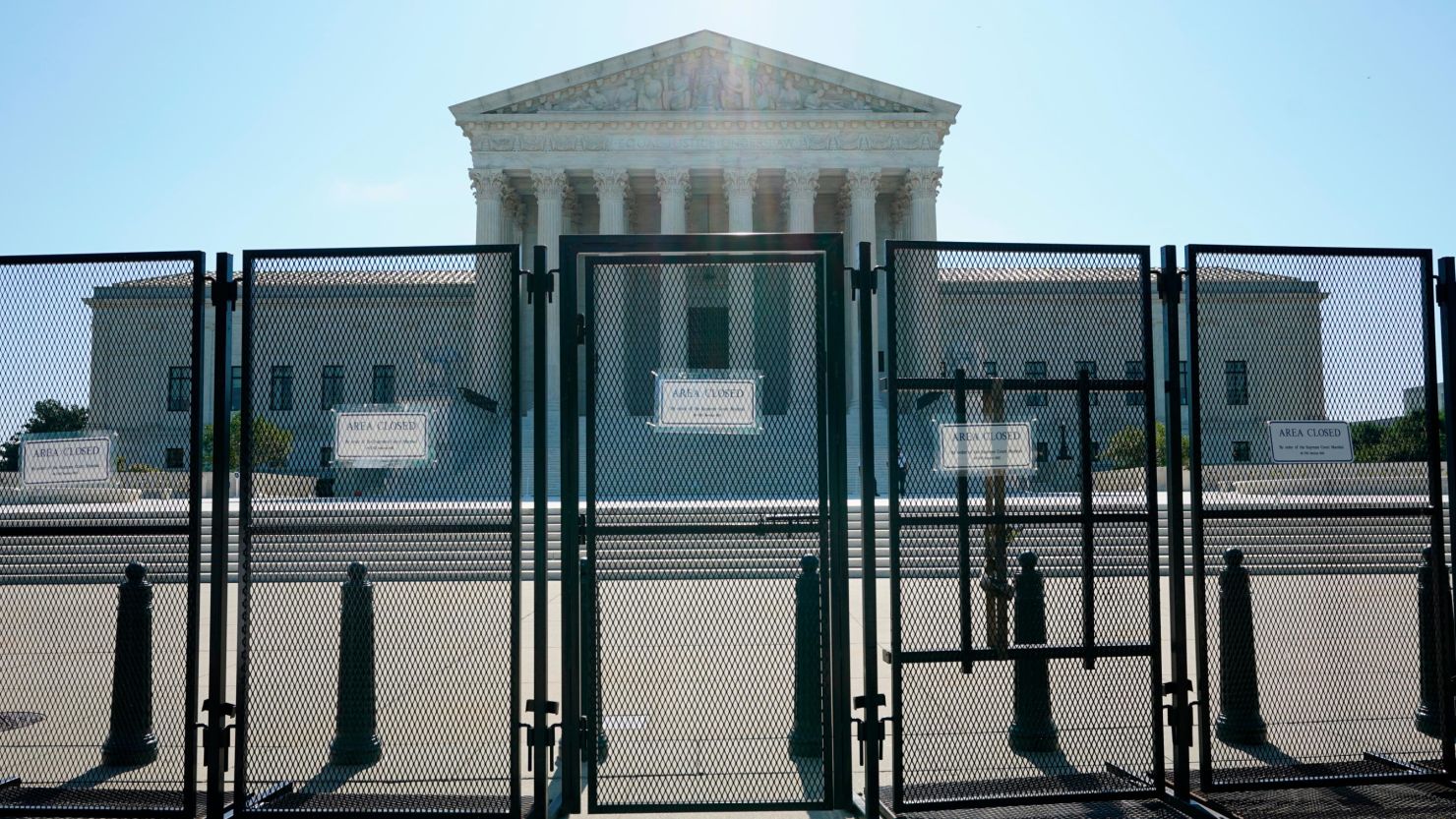 Biden signs bill extending security protections to families of Supreme