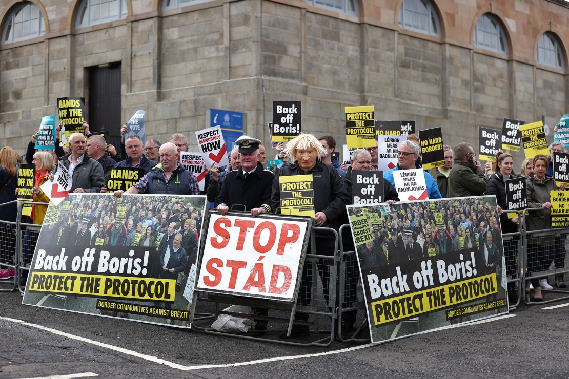 Campaigners from Border Communities Against Brexit protest outside Hillsborough Castle during a visit by Prime Minister Boris Johnson to Northern Ireland.