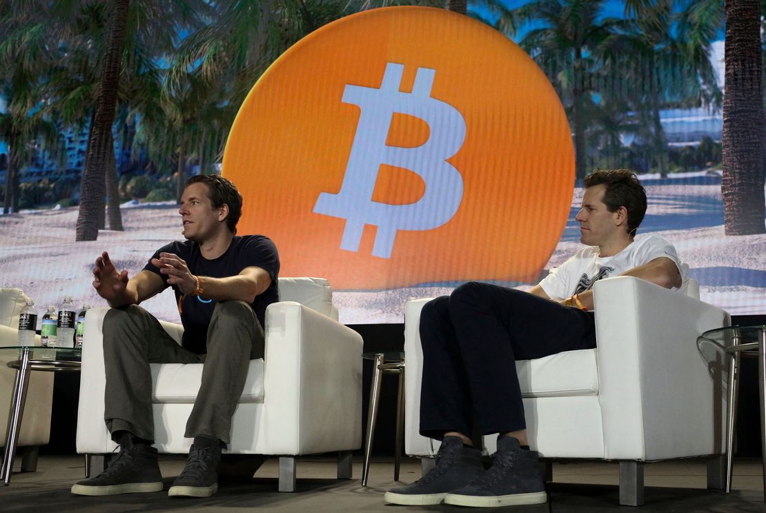 Tyler Winklevoss (L) and Cameron Winklevoss, founders of crypto exchange Gemini Trust Co., attend the crypto-currency conference Bitcoin 2021 Convention at the Mana Convention Center in Miami, Florida, on June 4, 2021. 
