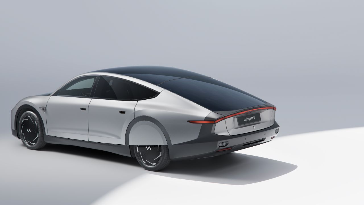 The Lightyear 0 car, shown here in a rendering, will begin production this fall. In addition to charging at plug points, it will get a boost from the solar panels on its roof, hood and trunk. 