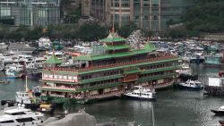 A video frame grab from AFPTV footage show Hong Kong's Jumbo Floating Restaurant, an iconic but aging tourist attraction designed like a Chinese imperial palace, being towed out of Aberdeen Harbour on June 14, 2022, after years of revitalisation efforts went nowhere. (Photo by Yan ZHAO / AFPTV / AFP) (Photo by YAN ZHAO/AFPTV/AFP via Getty Images)