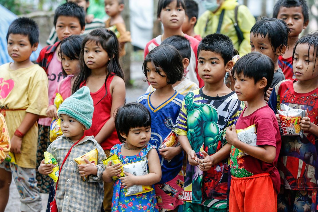 Children stand in a refugee camp along the Thai-Myanmar border.