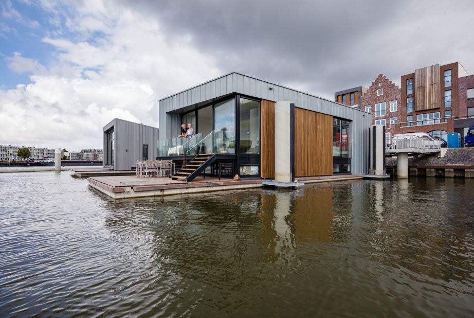 Waterstudio has also designed floating villas as part of a small water development in Dordrecht, the Netherlands. The houses have floor-to-ceiling windows and an outside terrace, but each is styled slightly differently. 