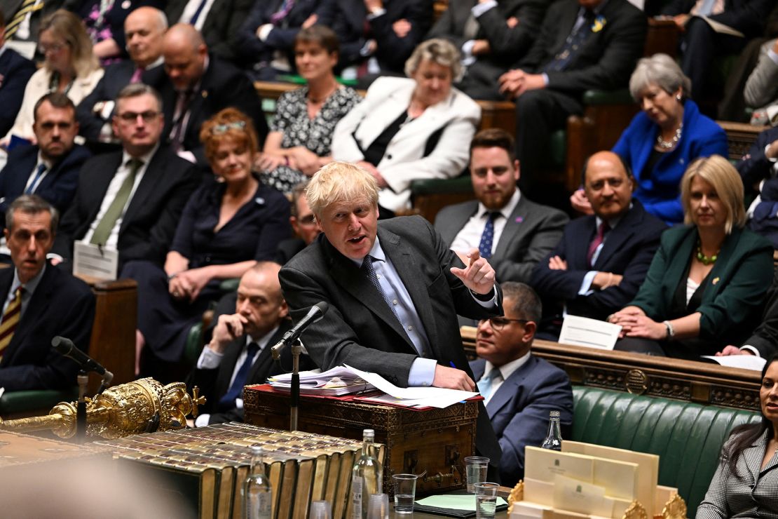Boris Johnson speaks as he takes questions at the House of Commons in London on June 15, 2022. 