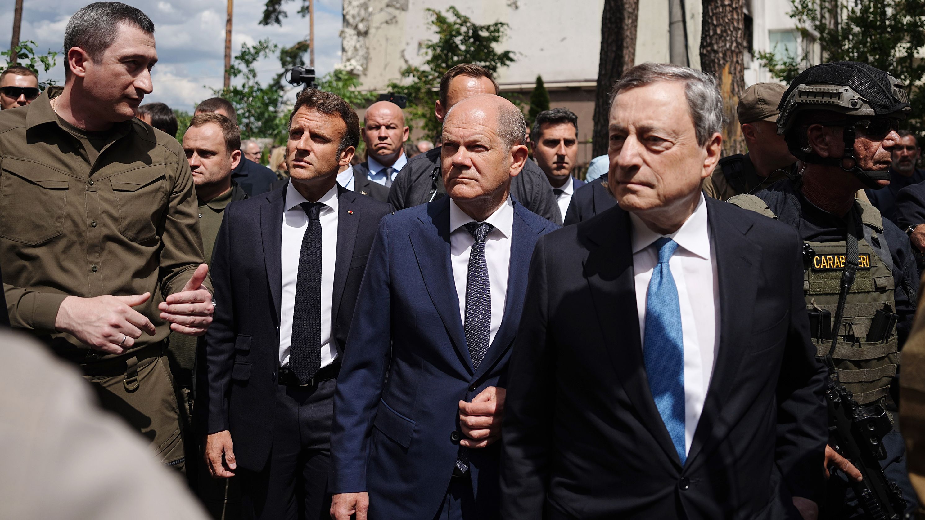 Oleksiy Chernyshov, Ukrainian President Zelensky's special envoy for EU accession, walks with <a href="https://edition.cnn.com/europe/live-news/russia-ukraine-war-news-06-16-22/h_ec3d0a0d6321a9206f39ebce9e1d255f" target="_blank">French President Emmanuel Macron, German Chancellor Olaf Scholz and Italian PM Mario Draghi</a> past destroyed buildings in Irpin, Ukraine, on June 16.