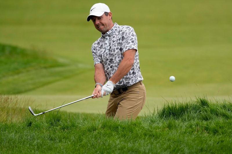 US Open: McIlroy slams club into sand after bunker-to-bunker