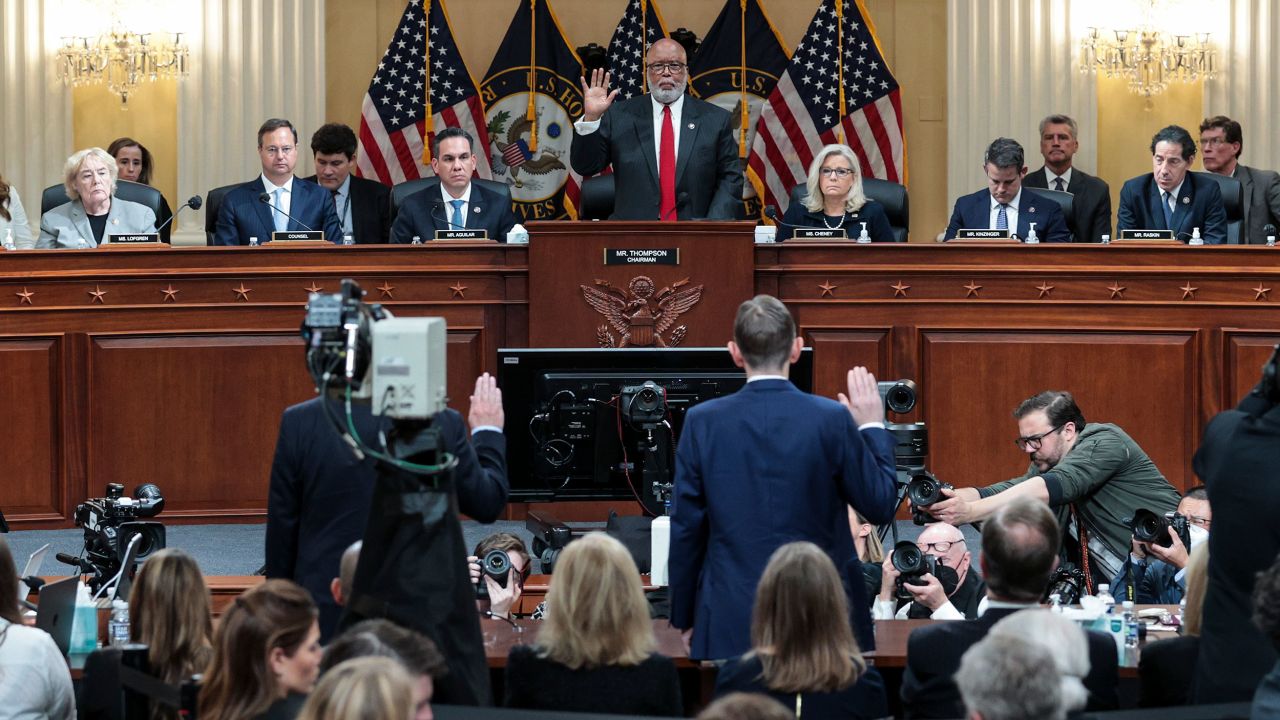 Thompson swears in two former Pence advisers during the committee's hearing on June 16.