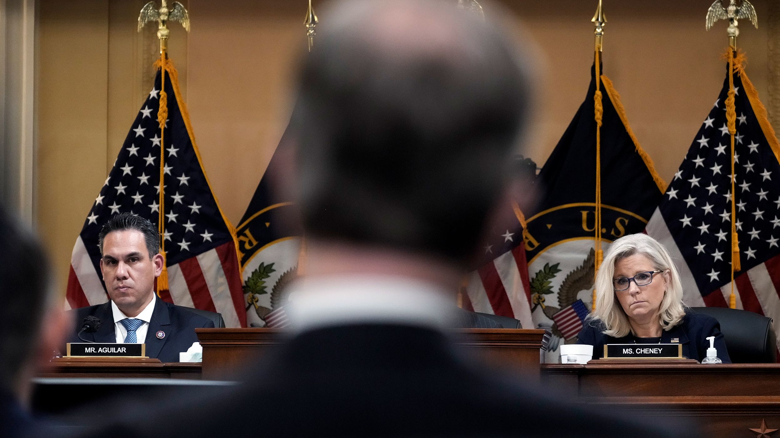 US Reps. Cheney and Pete Aguilar listen to testimony on June 16. Much of Thursday's presentation <a href="index.php?page=&url=https%3A%2F%2Fwww.cnn.com%2Fpolitics%2Flive-news%2Fjanuary-6-hearings-june-16%2Fh_668491f6b2d942e648e4c057fed586fa" target="_blank">was led by Aguilar,</a> a Democrat from Southern California.