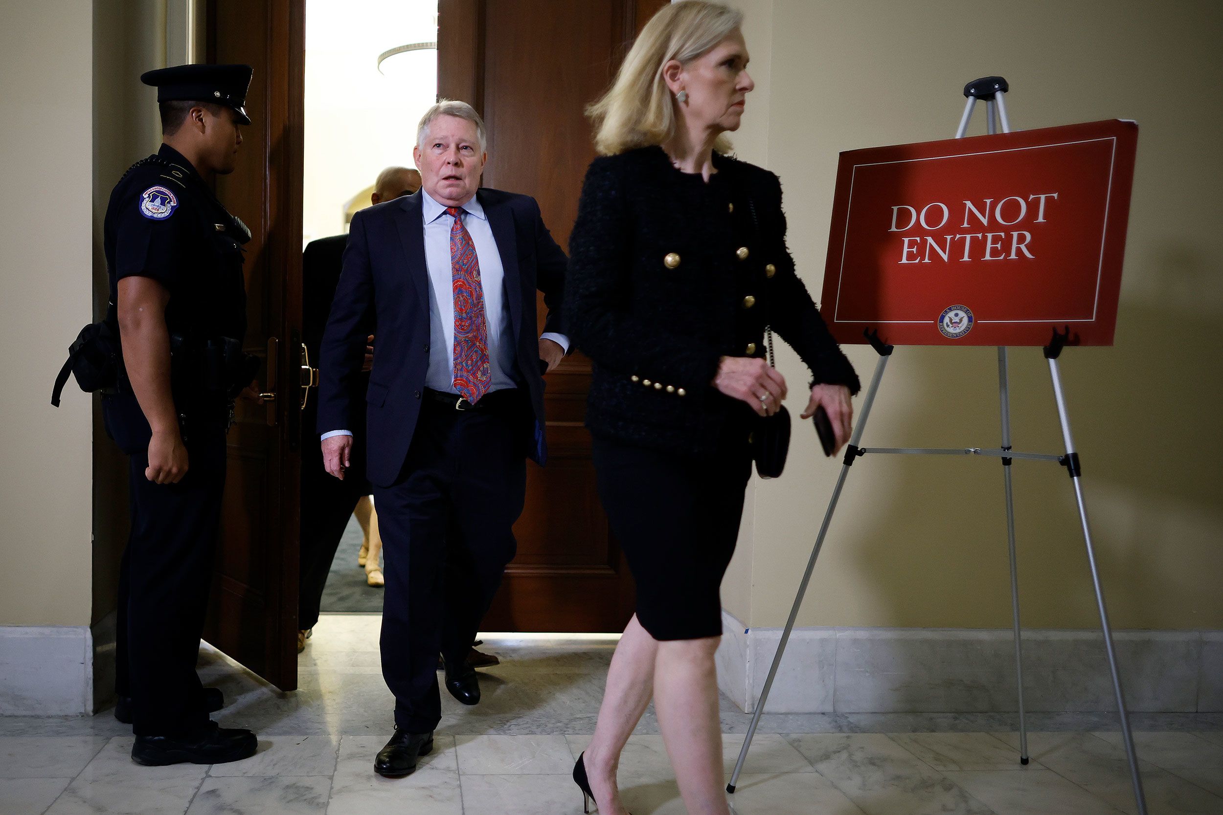 Luttig leaves the hearing room during a break in the June 16 hearing.