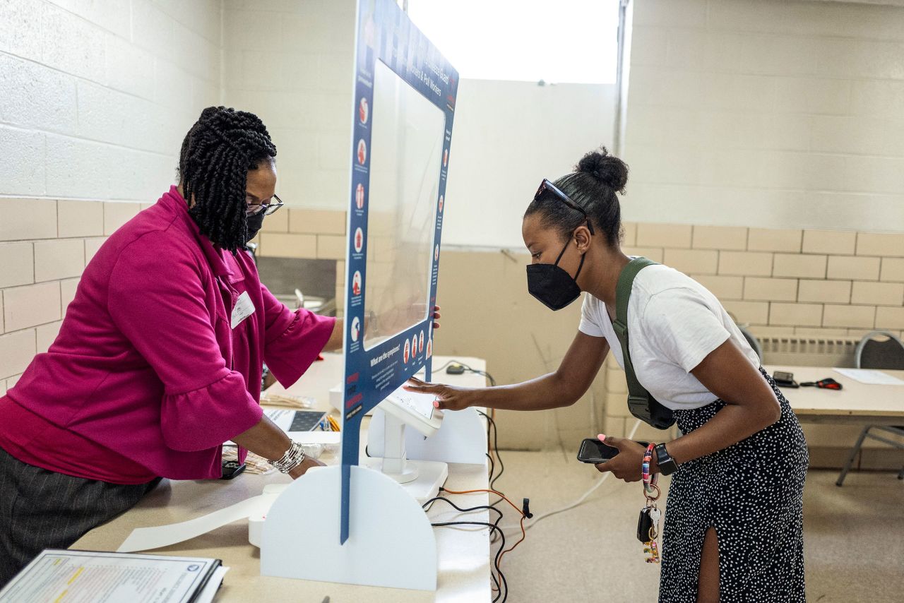 A voter in Columbia, South Carolina, prepares to cast her ballot in the state's primary election on Tuesday, June 14. Several states held their primaries on Tuesday. <a href="https://www.cnn.com/2022/06/15/politics/nevada-south-carolina-primary-takeaways/index.html" target="_blank">Here are five takeaways.</a>