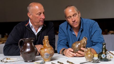 Julian (left) and Lincoln Barnwell show off some of their discoveries from the shipwreck. 