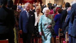 Britain's Queen Elizabeth II and Britain's Prince Charles, Prince of Wales arrive for the formal opening of the Commonwealth Heads of Government Meeting (CHOGM) at Buckingham Palace in London on April 19, 2018. - Britain's Queen Elizabeth II, the Head of the Commonwealth, opened the Commonwealth summit for what may be the last time on April 19, 2018, voicing hope that her son would be allowed to carry on her role.