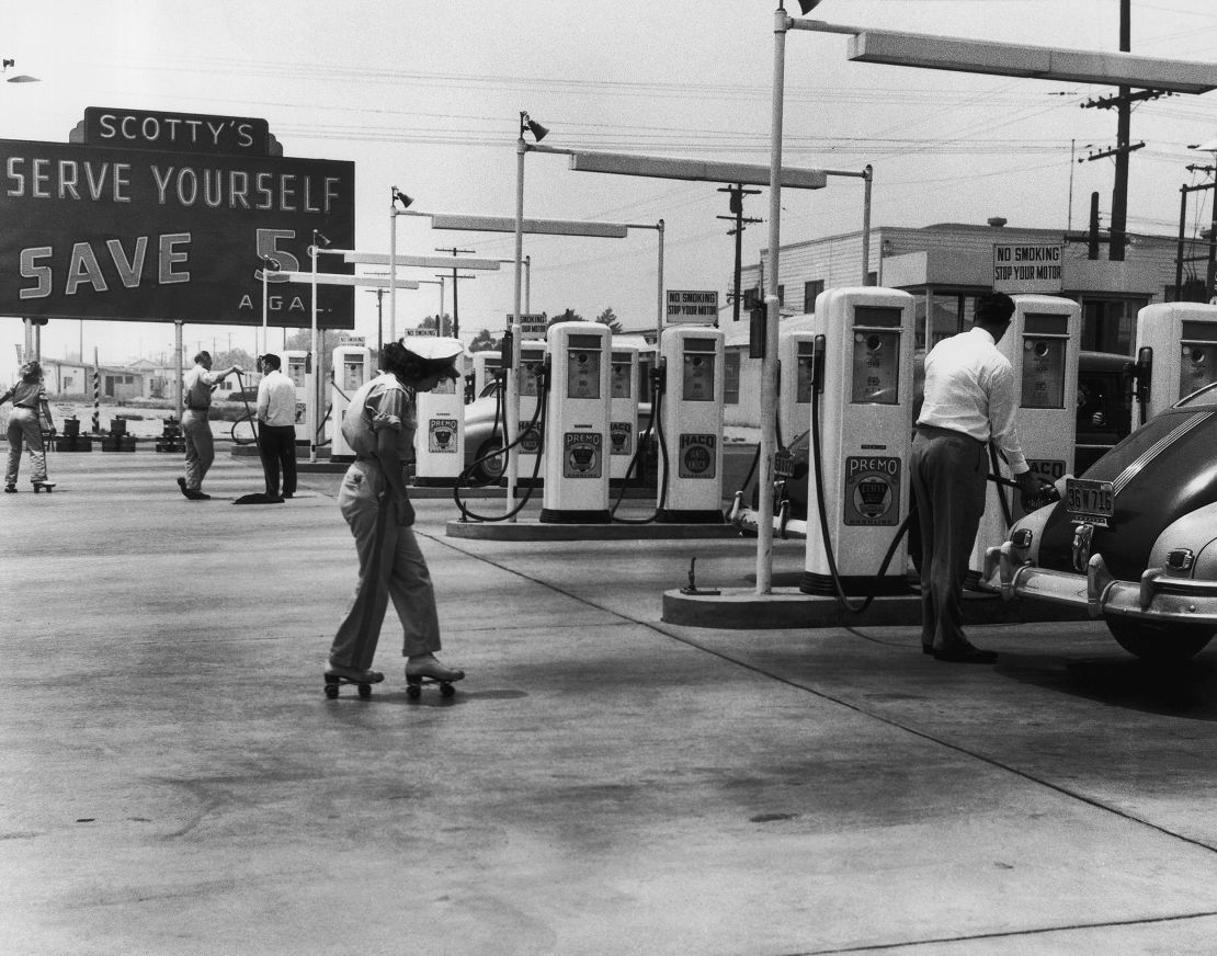 Self-service gas stations, like this early one in 1948, became popular as stations lost their hold on the auto service and repair market.