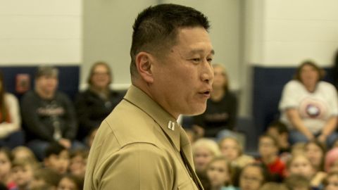 US Marine Capt. Grady Kurpasi, commanding officer of Headquarters Company, 2nd Marine Regiment, speaks to students in in Swansboro, North Carolina, January 25, 2019.