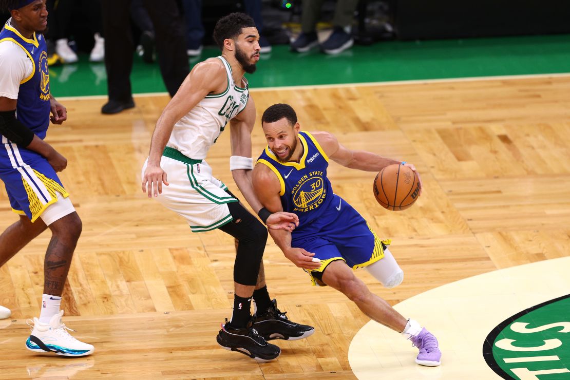 MVP Stephen Curry drives past Jayson Tatum of the Celtics in the deciding Game 6 in Boston.