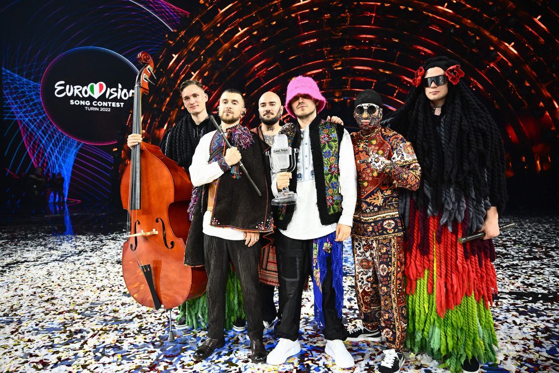 Members of the band Kalush Orchestra pose onstage after winning the Eurovision Song Contest 2022 on May 14.