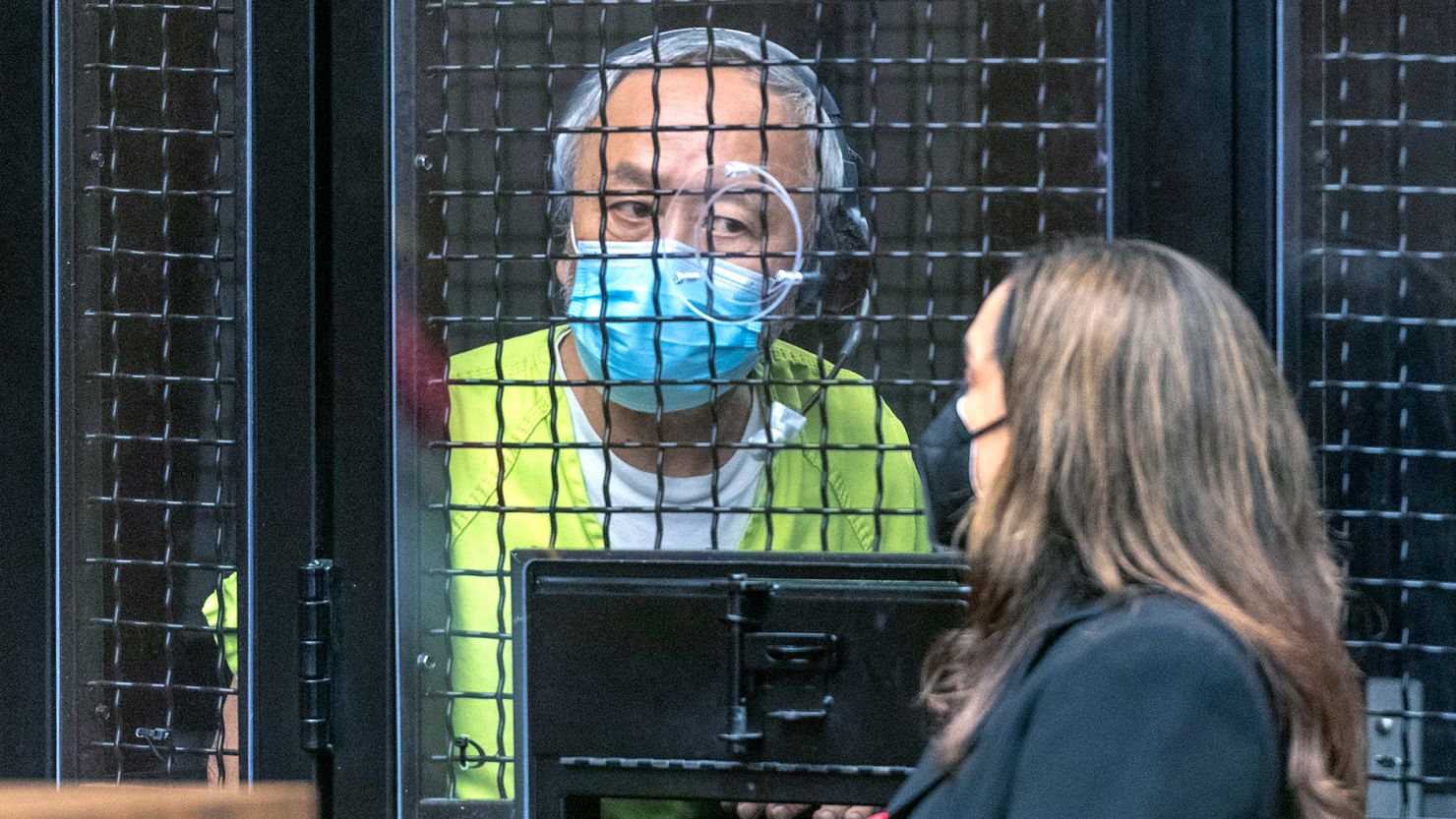 David Wenwei Chou makes his first in-person appearance in superior court for an arraignment in Santa Ana with Deputy Public Defender Jennifer Ryan on Friday, June 10, 2022.