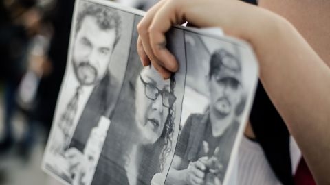 A protester demonstrates against the killings of three journalists -- Jose Luis Arenas, Margarito Martinez and Lourdes Maldonado -- in January.
