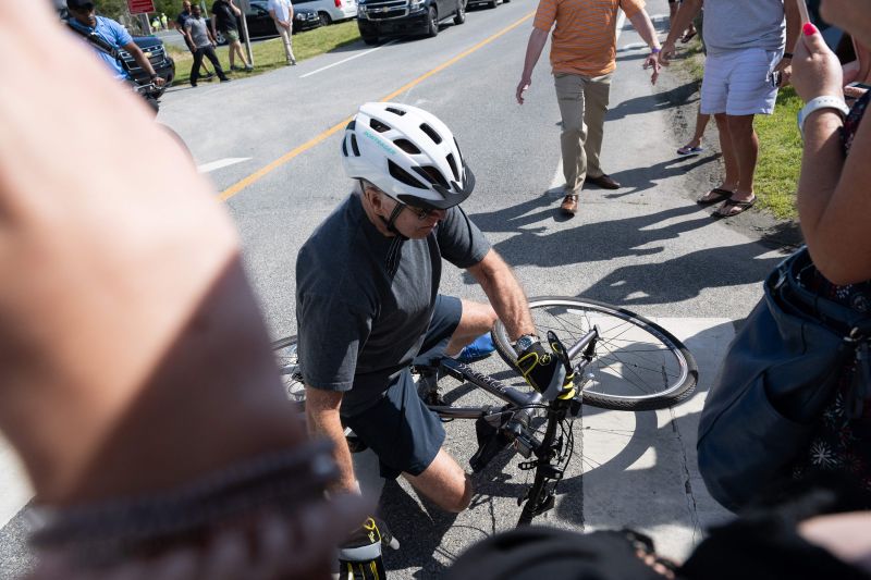 Biden falls while riding his bike