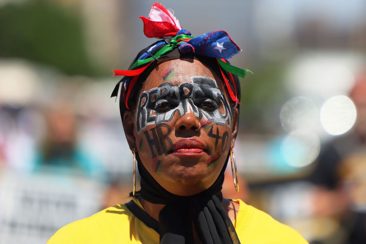 Saleema Hadi marches in the Juneteenth reparations rally in Newark on Friday.