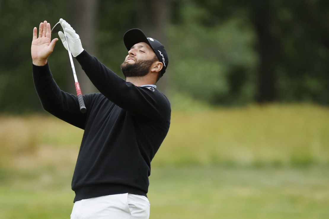 Rahm reacts after his second shot on the 12th hole.